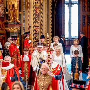 The King and Queen process through the Royal Gallery of the House of Lords