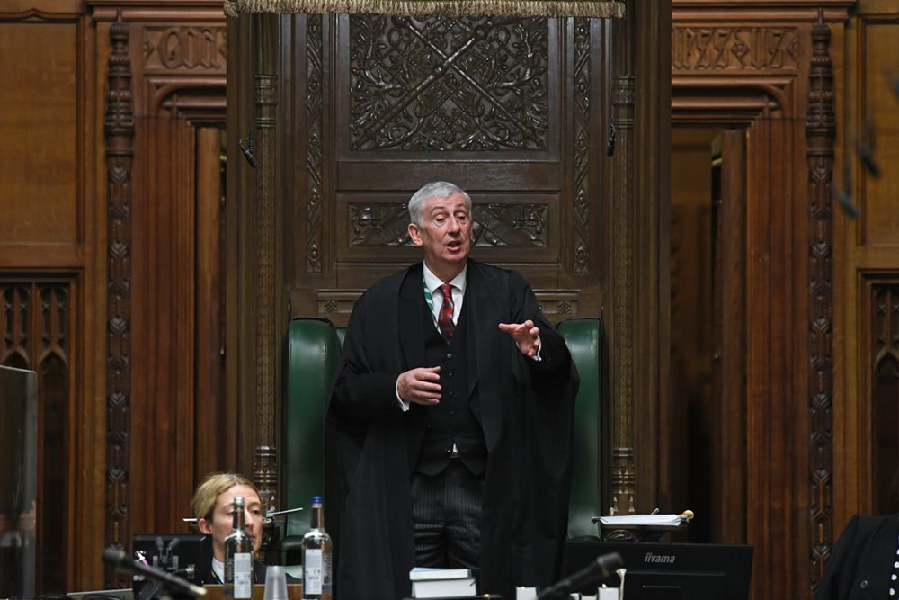 A photograph of the Speaker of the House of Commons rising from his Chair in the Chamber of the House of Commons