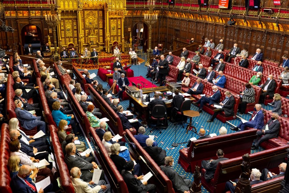 A busy House of Lords chamber with members filling the benches