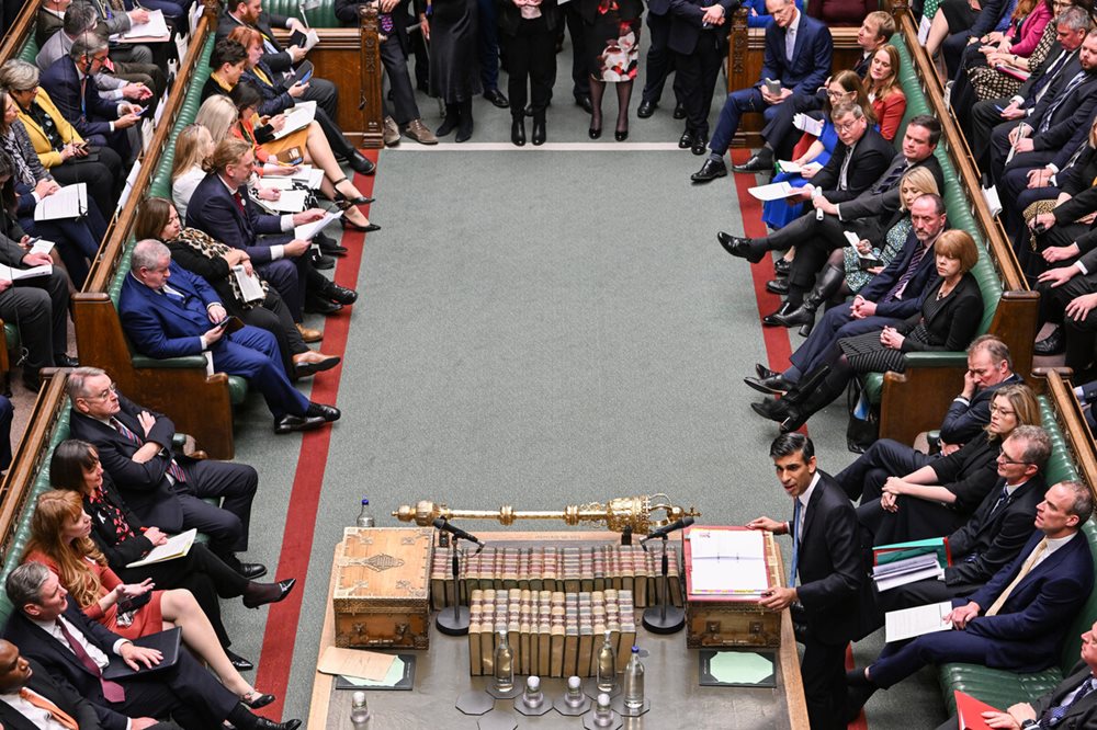 The House of Commons Chamber from above with MPs seated on the benches and PM Rishi Sunak at the dispatch box